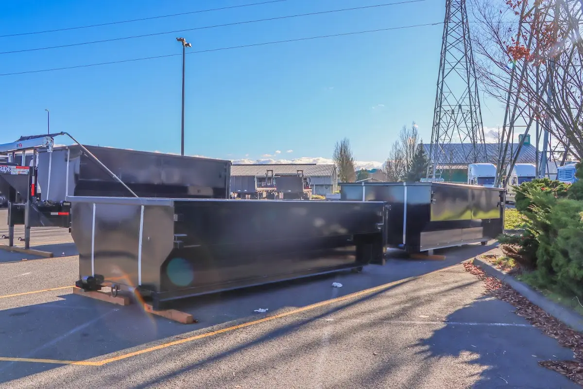 Roll-off dumpster ready for waste disposal at job site for Construction Dumpster Rental in Lewiston